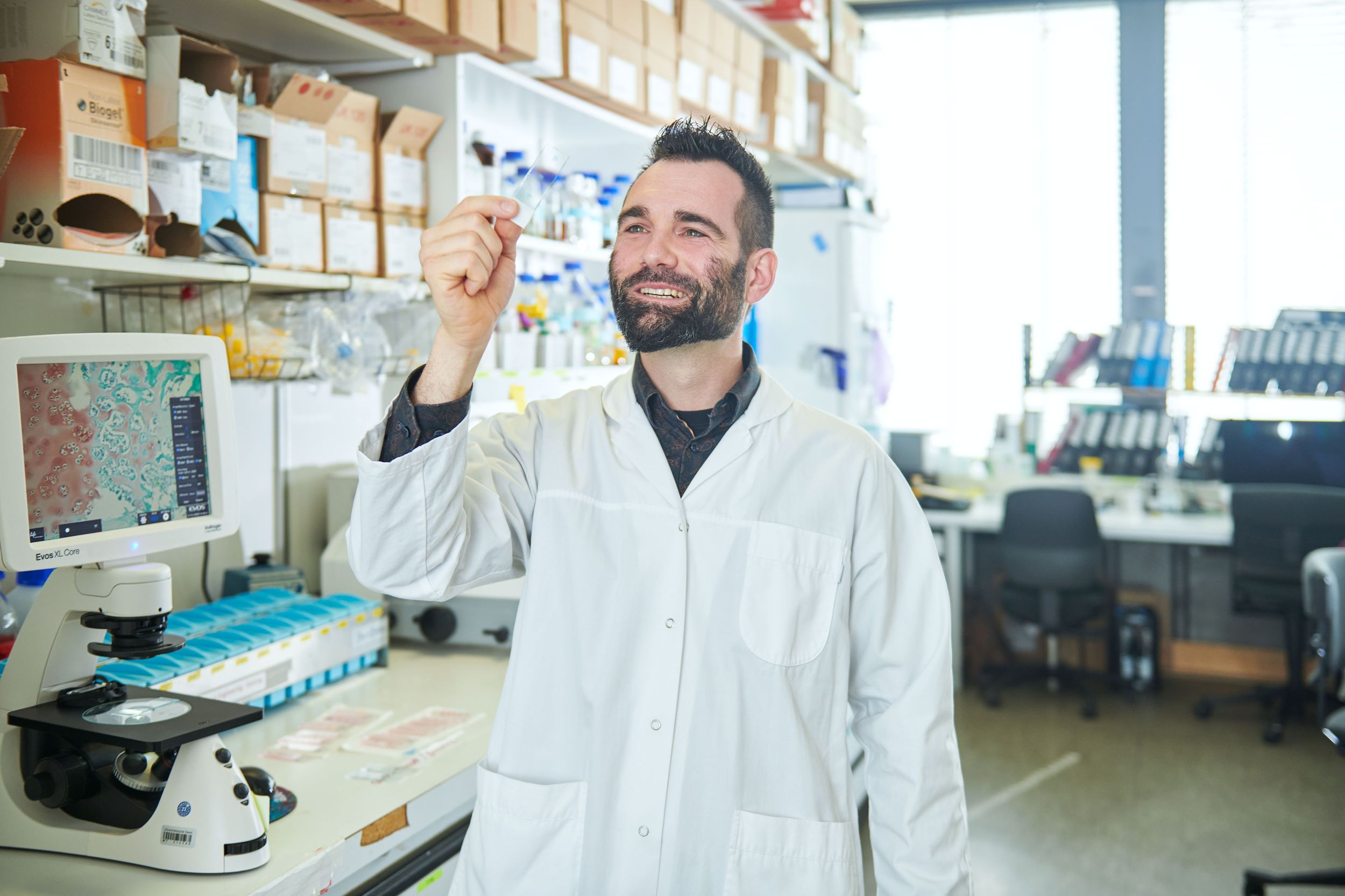 Researchers from the Department of Biomedicine in the laboratory