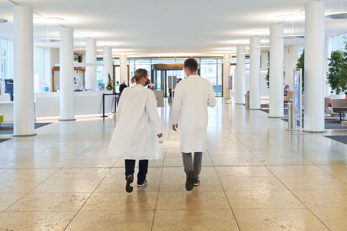 Doctors in the entrance hall of a hospital